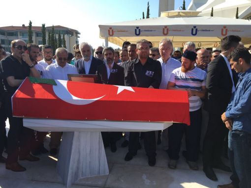 Erol Olçok ve oğlu Abdullah Tayyip Olçok düzenlenen törenle toprağa verildi.